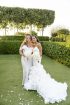 Strapless Mermaid Wedding Gown with Dramatic Ruffle Train